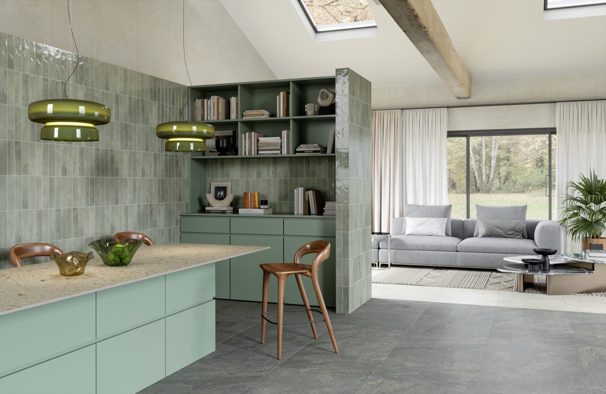 Desayunador en una cocina con muros en tonos verdes, una viga de madera que aporta carácter, y ventanas en el techo para una óptima iluminación natural.
